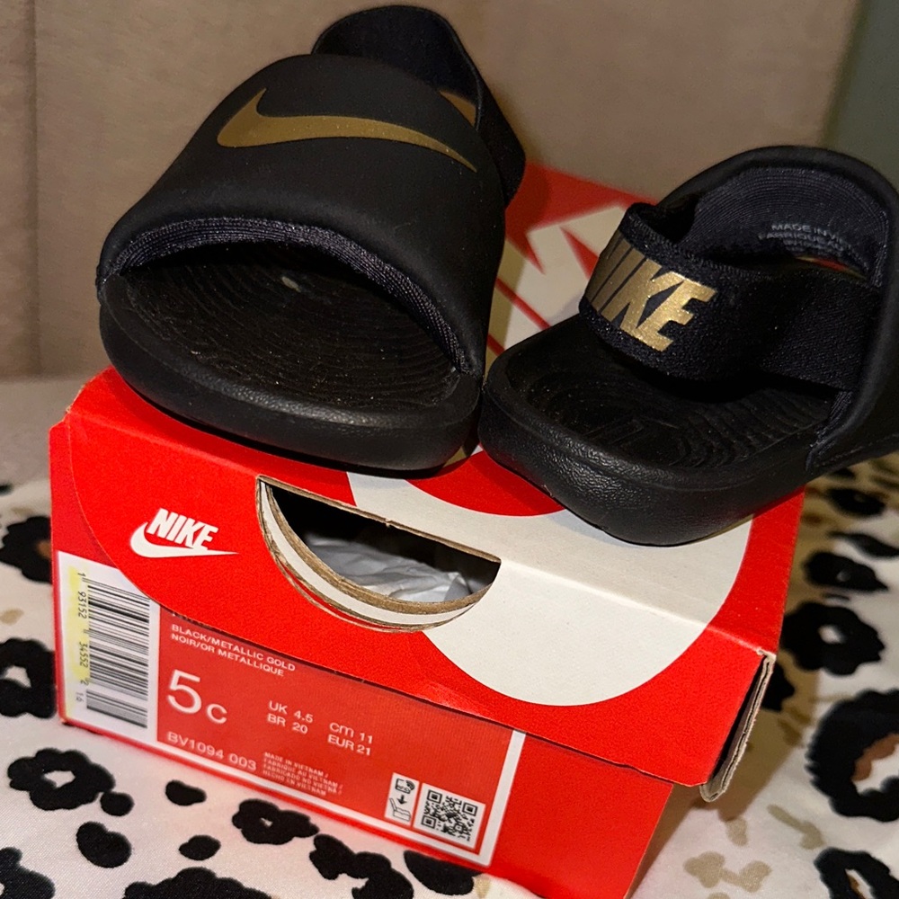 Nike Kids Black and Gold Slide Sandals